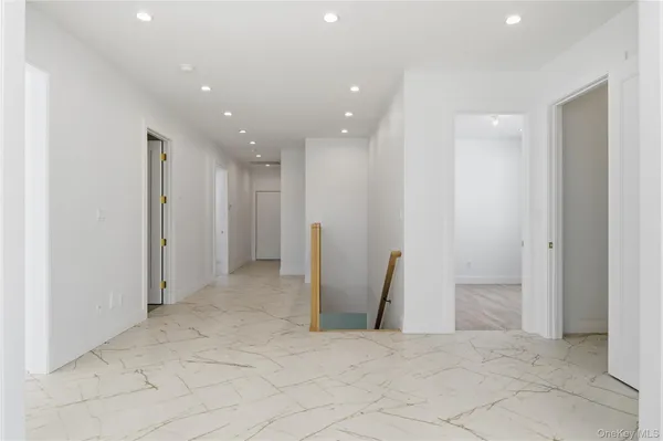 a view of a hallway with closet