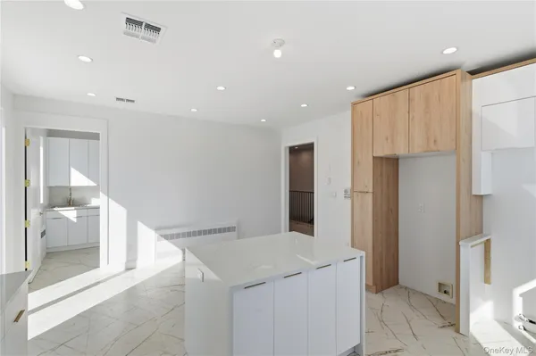 a kitchen with stainless steel appliances a refrigerator and a sink