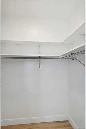 a view of small space with racks on the wall