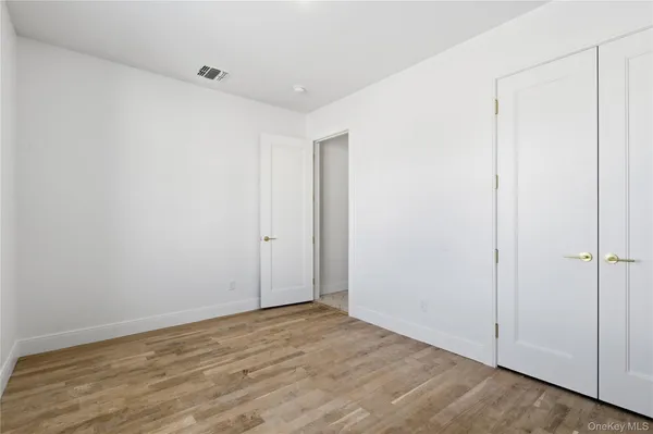 a view of a room with an empty space