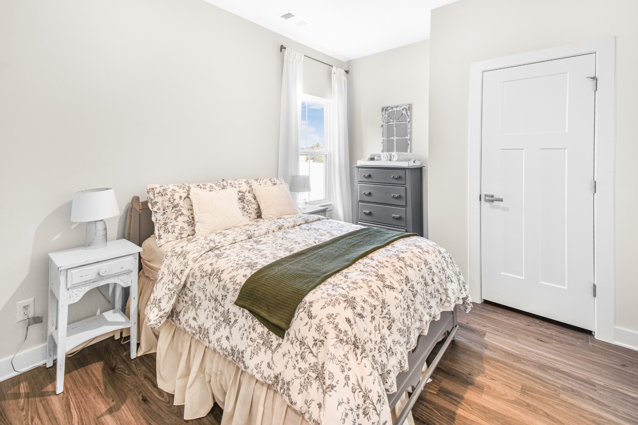 308 Collier Road Mount Juliet, TN 37122 - Photo 27 of 36 a bedroom with a bed and a cabinets