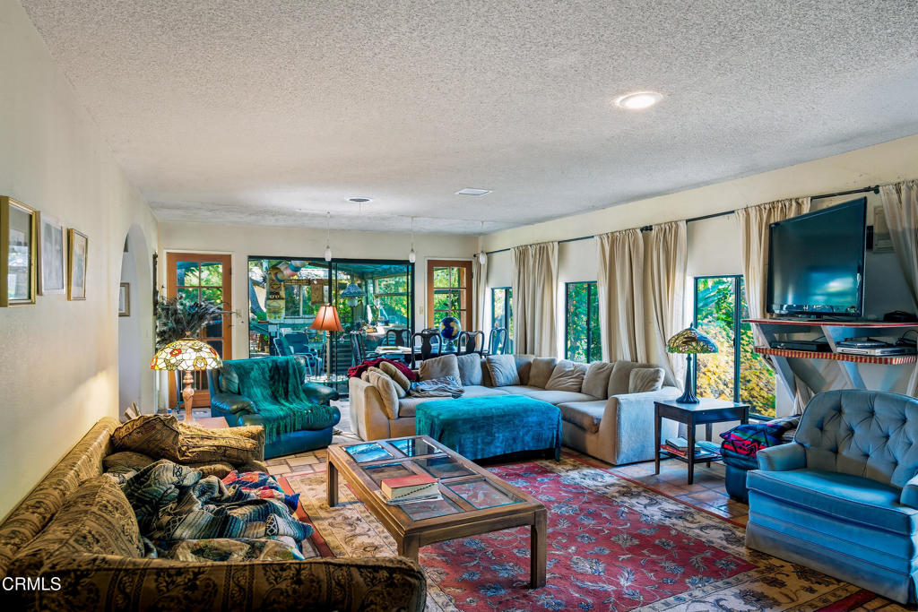 1400 Park Road Ojai, CA 93023 - Photo 24 of 67 a living room with furniture and a flat screen tv
