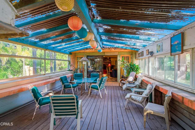 a view of livingroom with furniture window and wooden floor