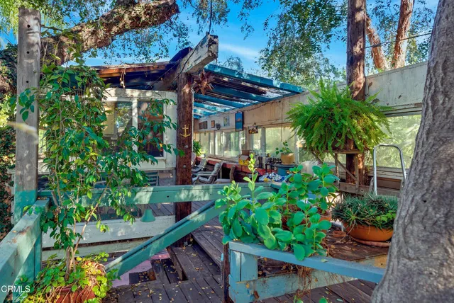 a bathroom with a sink a mirror and a shower