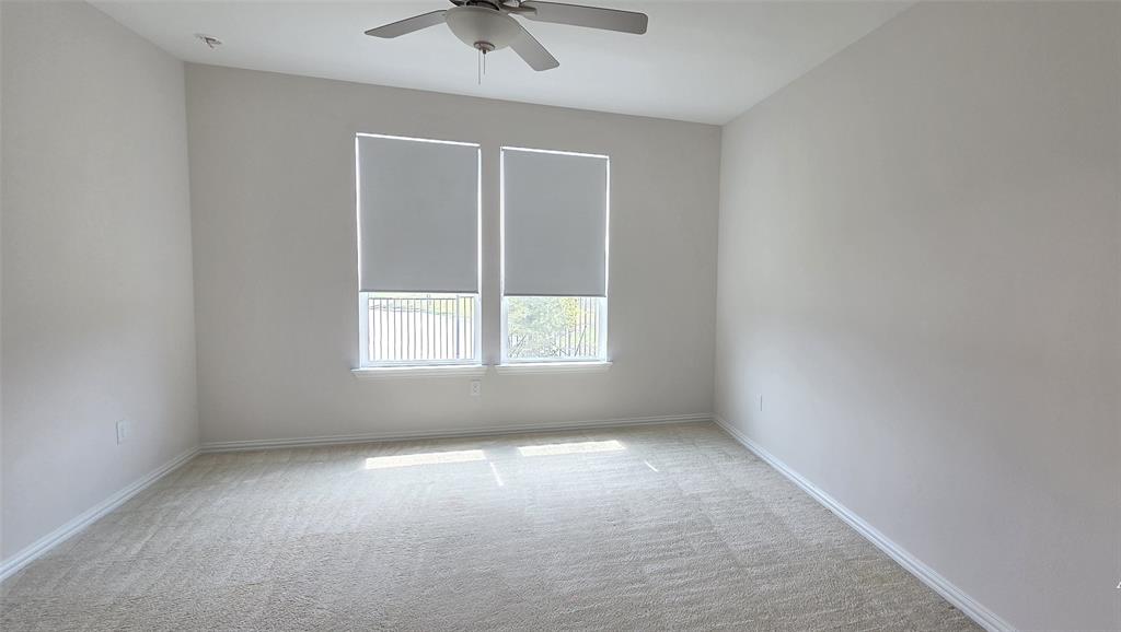 916 Elizabeth Street Anna, TX 75409 - Photo 13 of 31 an empty room with a window