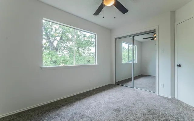 a kitchen with a stove and a refrigerator