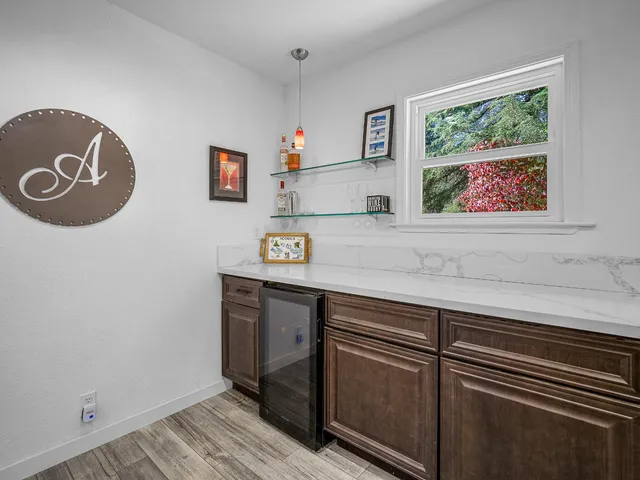 a view of cabinets with wooden floor