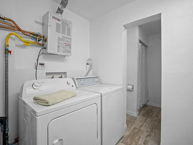 a utility room with dryer and washer