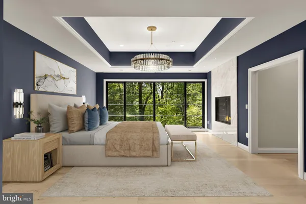 a living room with furniture and large windows