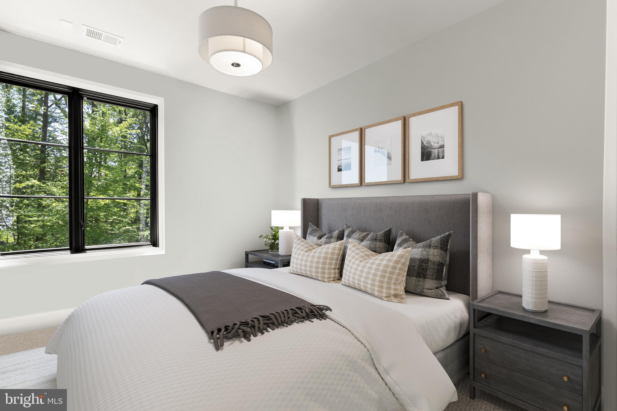 3 Bay Tree Lane Bethesda, MD 20816 - Photo 34 of 50 a bedroom with a bed and a window