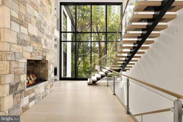 a view of an entryway with wooden floor