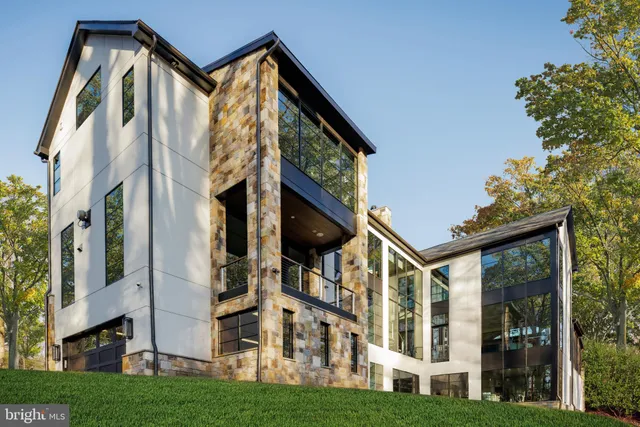 front view of building with a yard