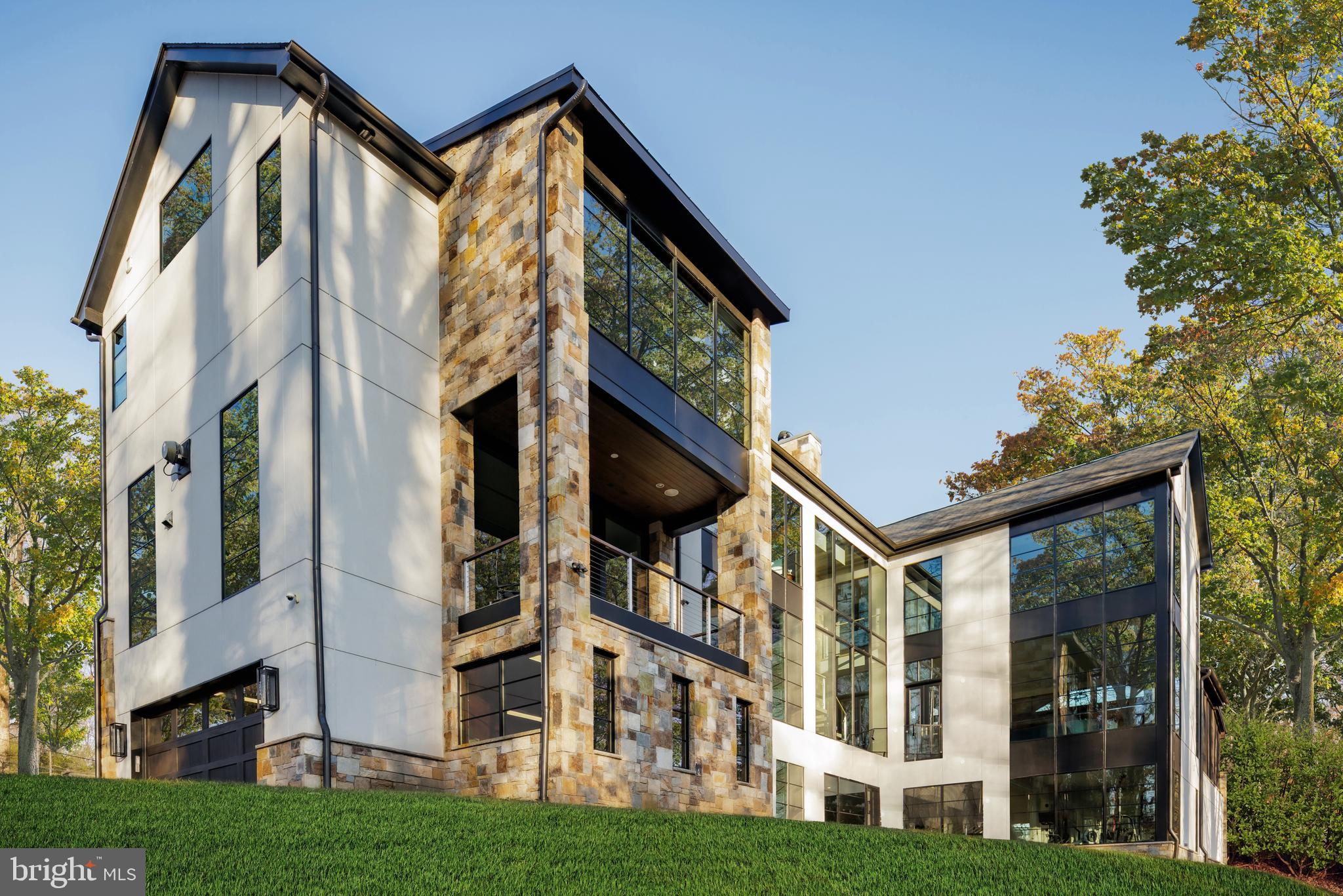 3 Bay Tree Lane Bethesda, MD 20816 - Photo 45 of 50 front view of building with a yard