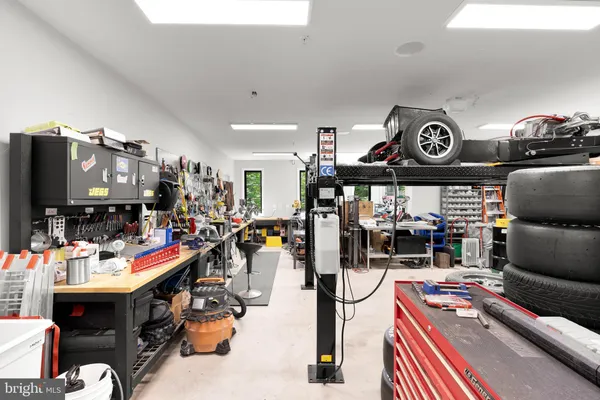 a room with furniture and a flat screen tv