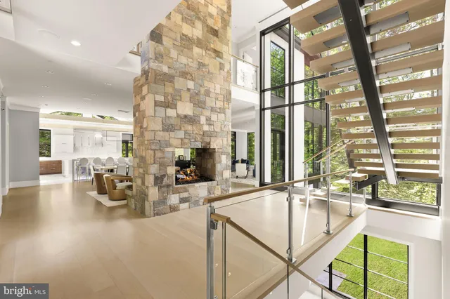 a kitchen with a large window and a table