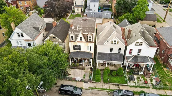 a view of house with a swimming pool