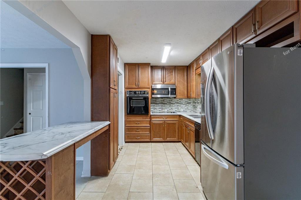 392 Harmony Grove Road Lilburn, GA 30047 - Photo 8 of 25