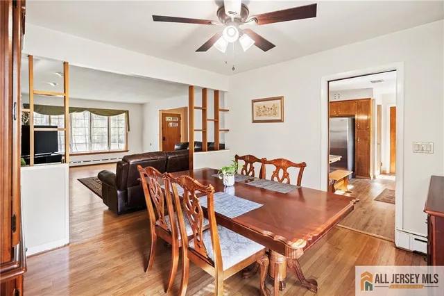 a view of a dining room with furniture