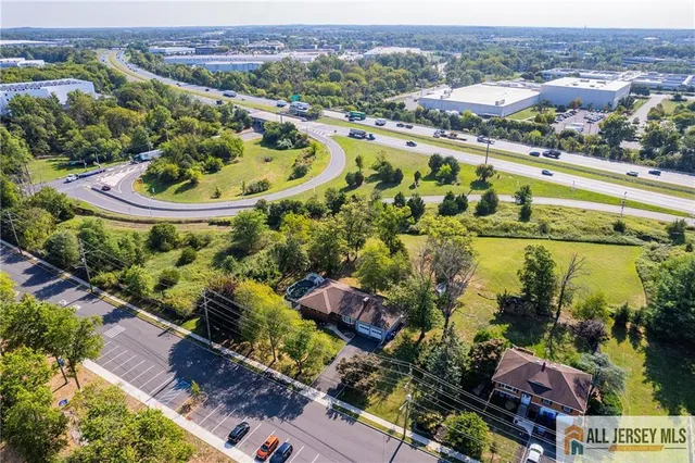 an aerial view of lake and residential houses