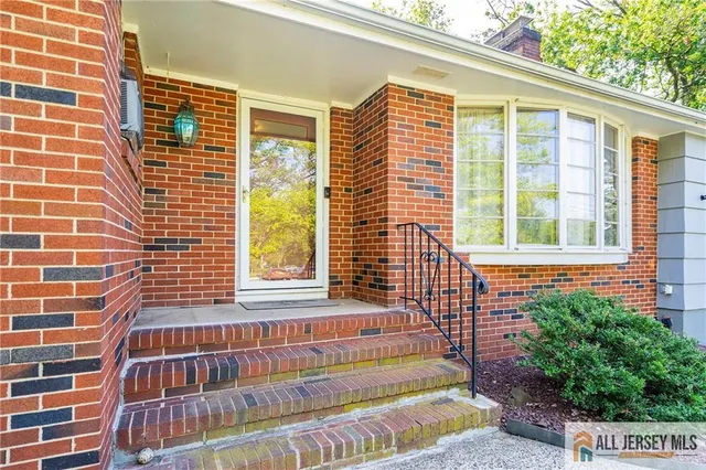 a view of front door with outdoor space