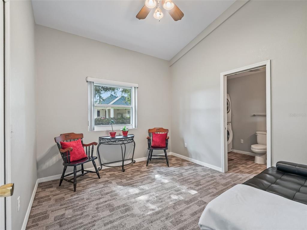 402 Southwest 127th Place Ocala, FL 34473 - Photo 59 of 75 a living room with furniture and wooden floor