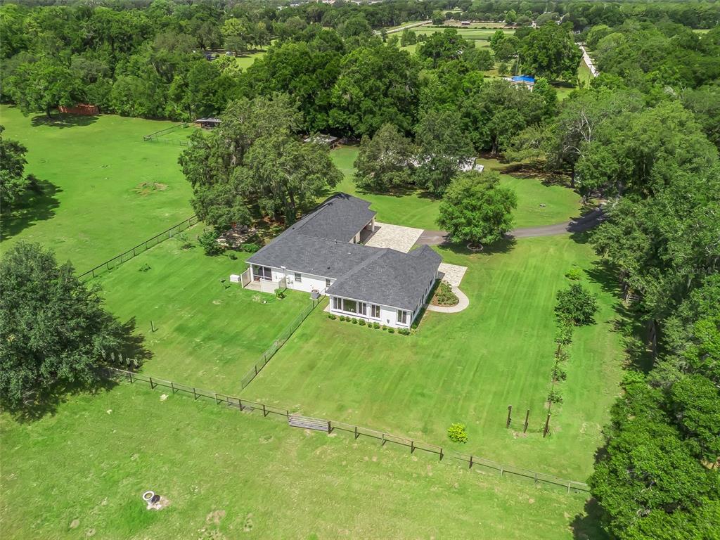 402 Southwest 127th Place Ocala, FL 34473 - Photo 73 of 75 an aerial view of a house with a yard