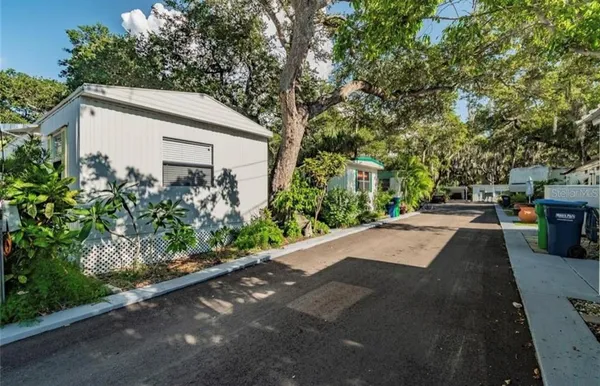 a view of a back yard of the house