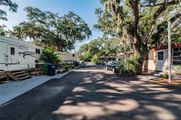 a view of a street with some trees