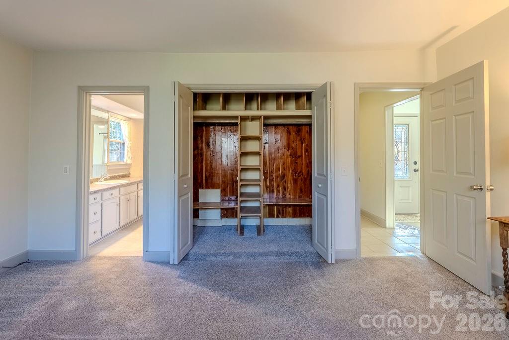 2212 Wayah Road Franklin, NC 28734 - Photo 12 of 47 a view of a room with furniture and a window