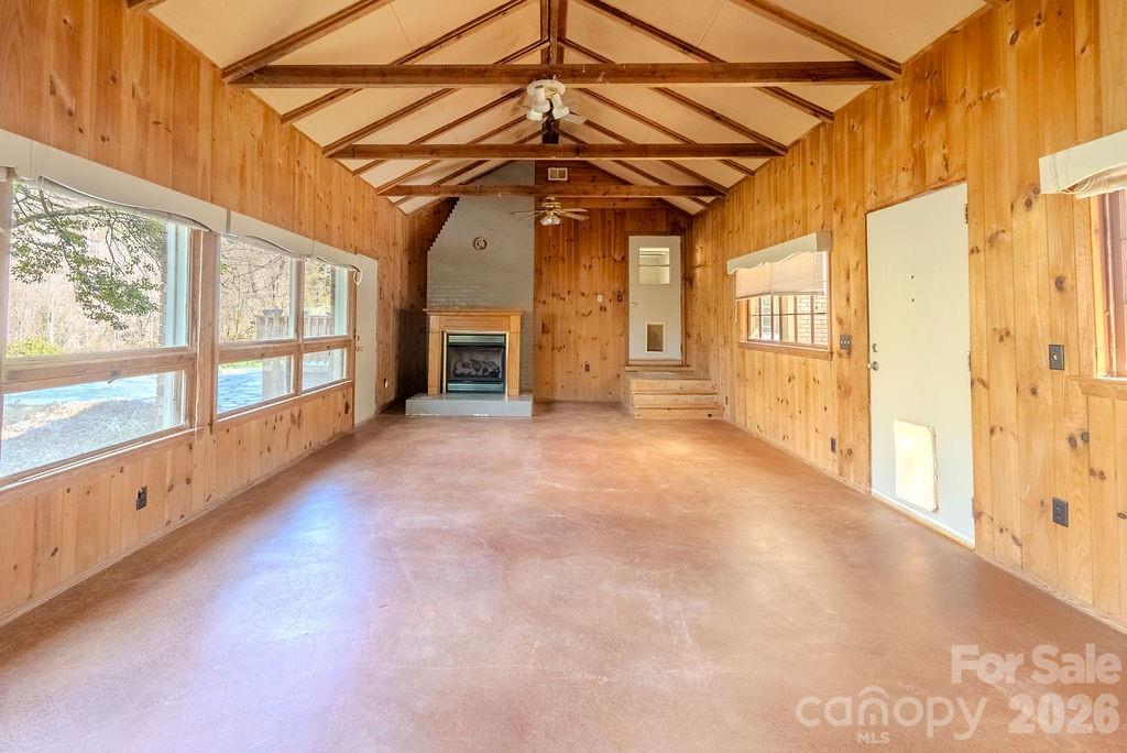 2212 Wayah Road Franklin, NC 28734 - Photo 21 of 47 a view of a porch with wooden floor and windows