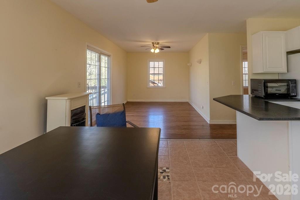 2212 Wayah Road Franklin, NC 28734 - Photo 25 of 47 a view of a livingroom with furniture and a fireplace