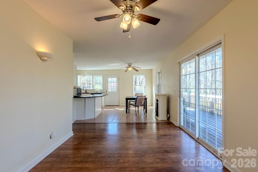 2212 Wayah Road Franklin, NC 28734 - Photo 29 of 47 a view of dining room with furniture wooden floor and chandelier