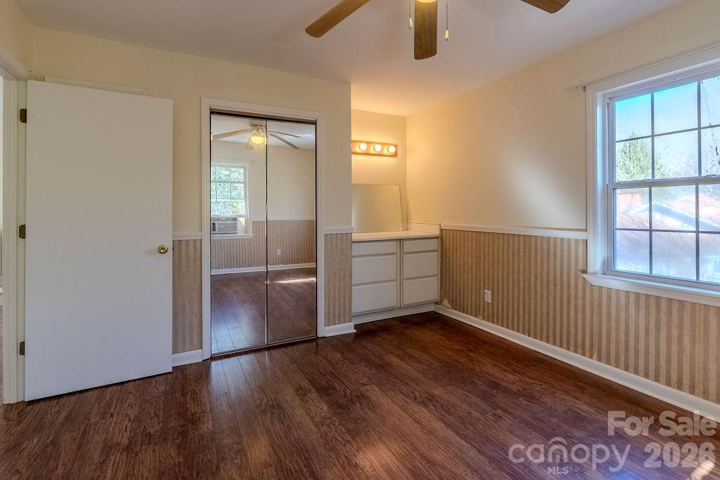 2212 Wayah Road Franklin, NC 28734 - Photo 30 of 47 wooden floor in an empty room with a window
