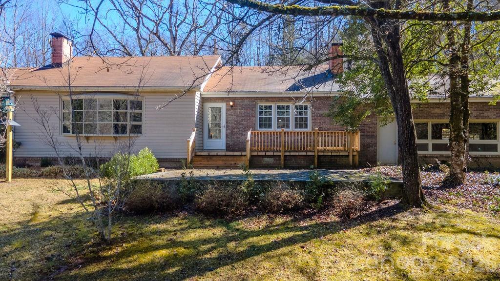 2212 Wayah Road Franklin, NC 28734 - Photo 39 of 47 a view of a house with a yard and furniture