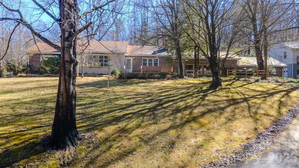 2212 Wayah Road Franklin, NC 28734 - Photo 41 of 47 a view of a house with a yard covered with snow