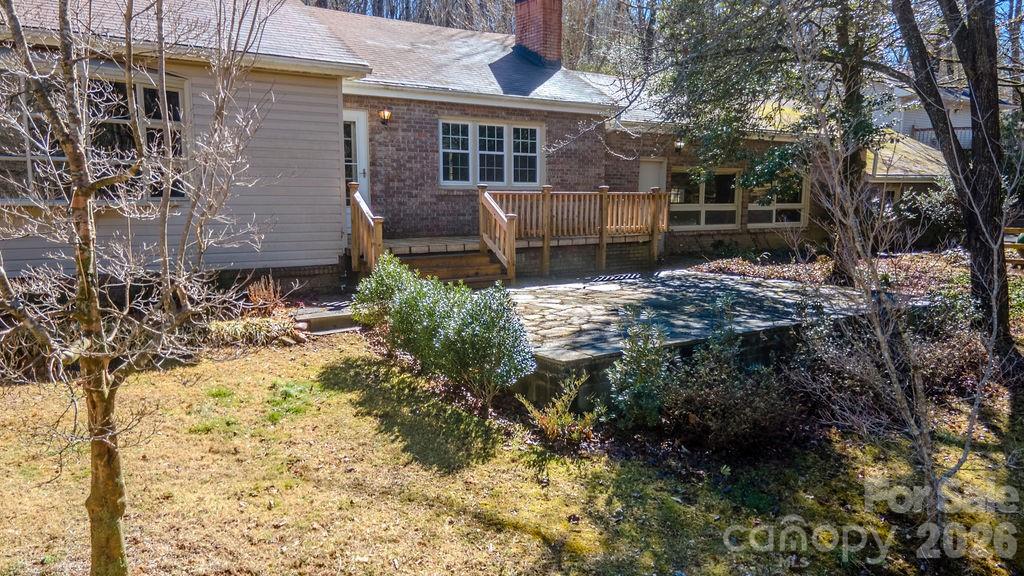 2212 Wayah Road Franklin, NC 28734 - Photo 42 of 47 a front view of a house with a yard