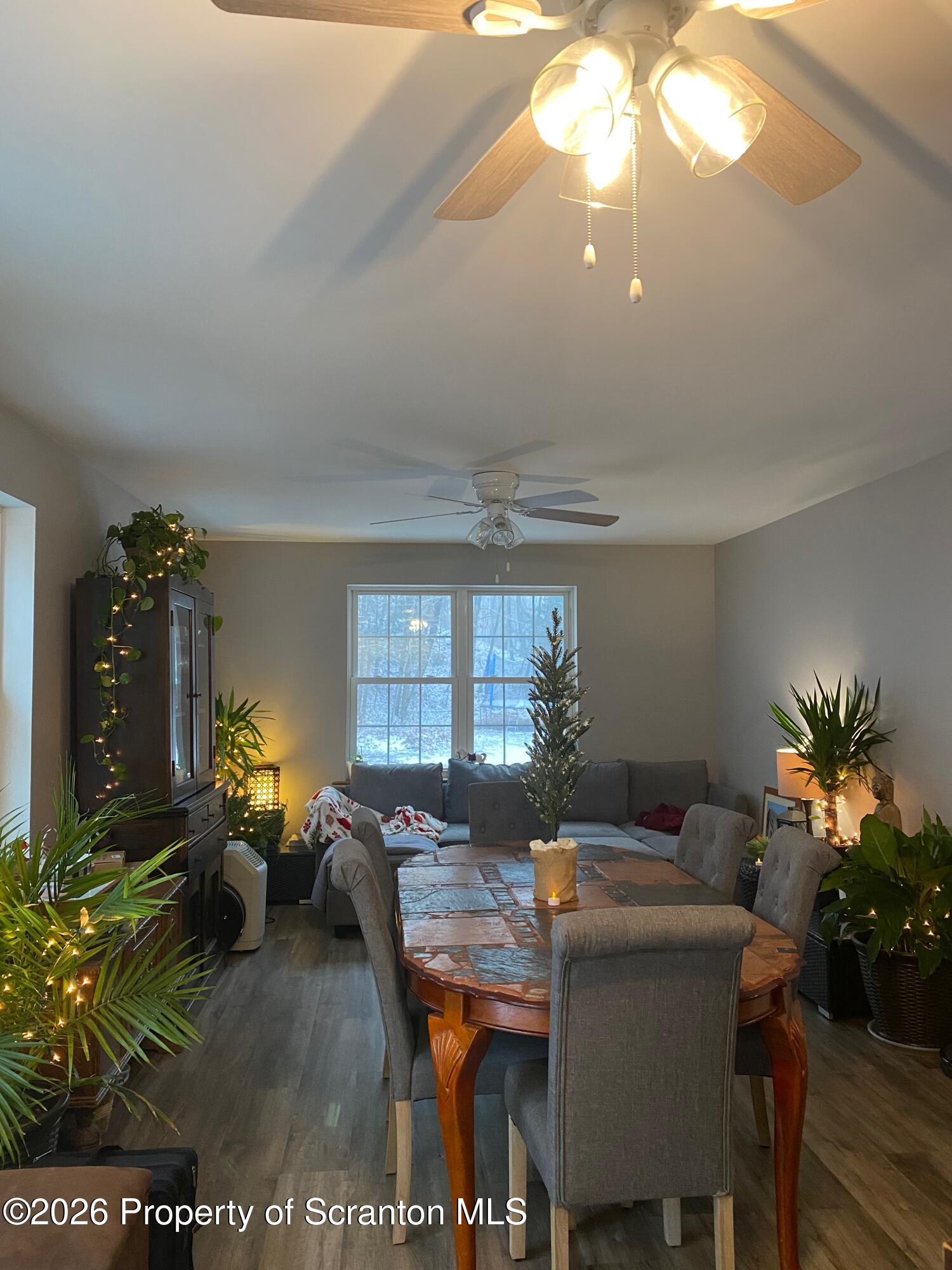 155 Baylor Road Nicholson, PA 18446 - Photo 30 of 53 a view of a dining room with furniture window and wooden floor