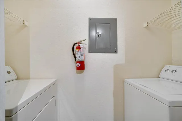 a utility room with dryer and washer