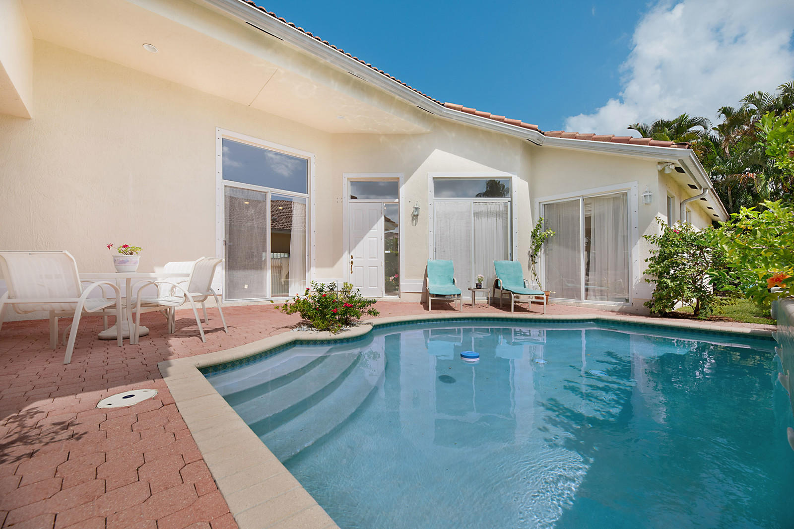7150 Northwest Turtle Walk Boca Raton, FL 33487 - Photo 3 of 28 pool interior courtyar