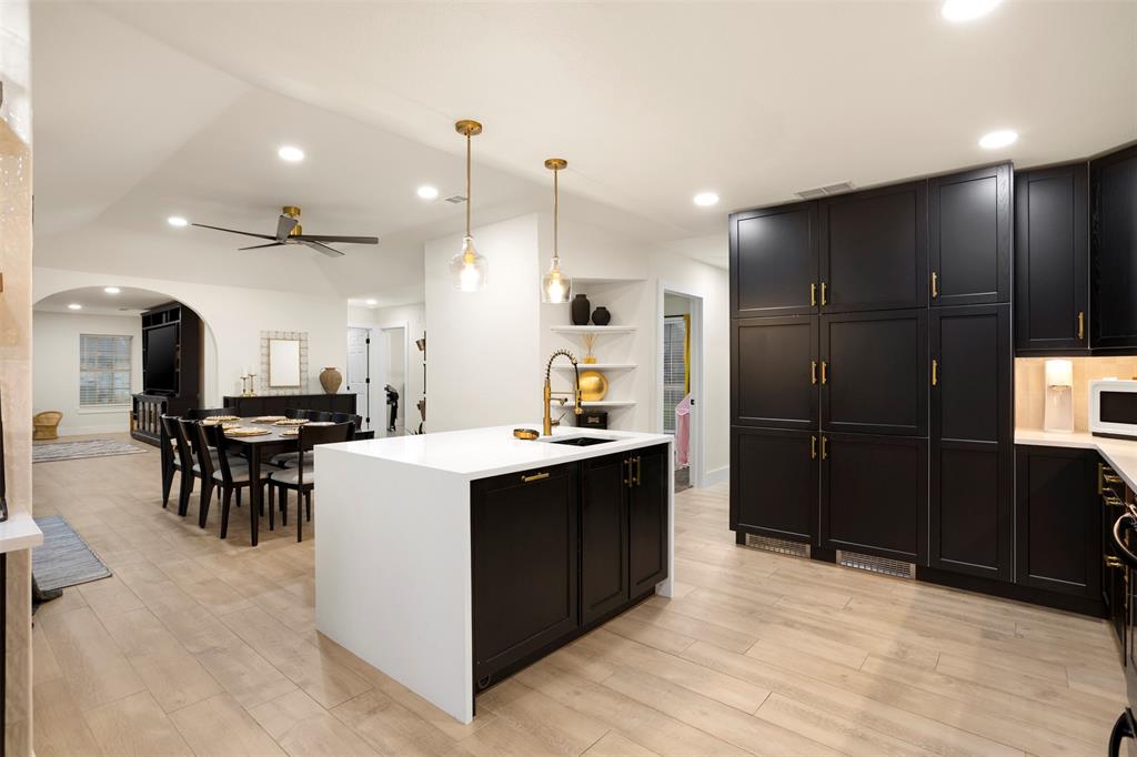 1121 Pierce Road Red Oak, TX 75154 - Photo 14 of 40 a large kitchen with a table and chairs