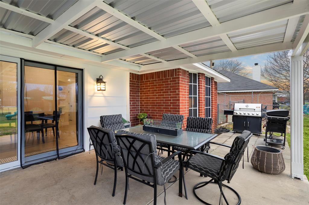 1121 Pierce Road Red Oak, TX 75154 - Photo 30 of 40 a view of a dining room with furniture window and outside view