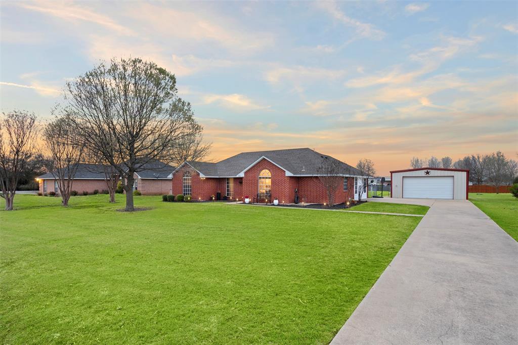 1121 Pierce Road Red Oak, TX 75154 - Photo 6 of 40 a view of house with a big yard plants and large trees