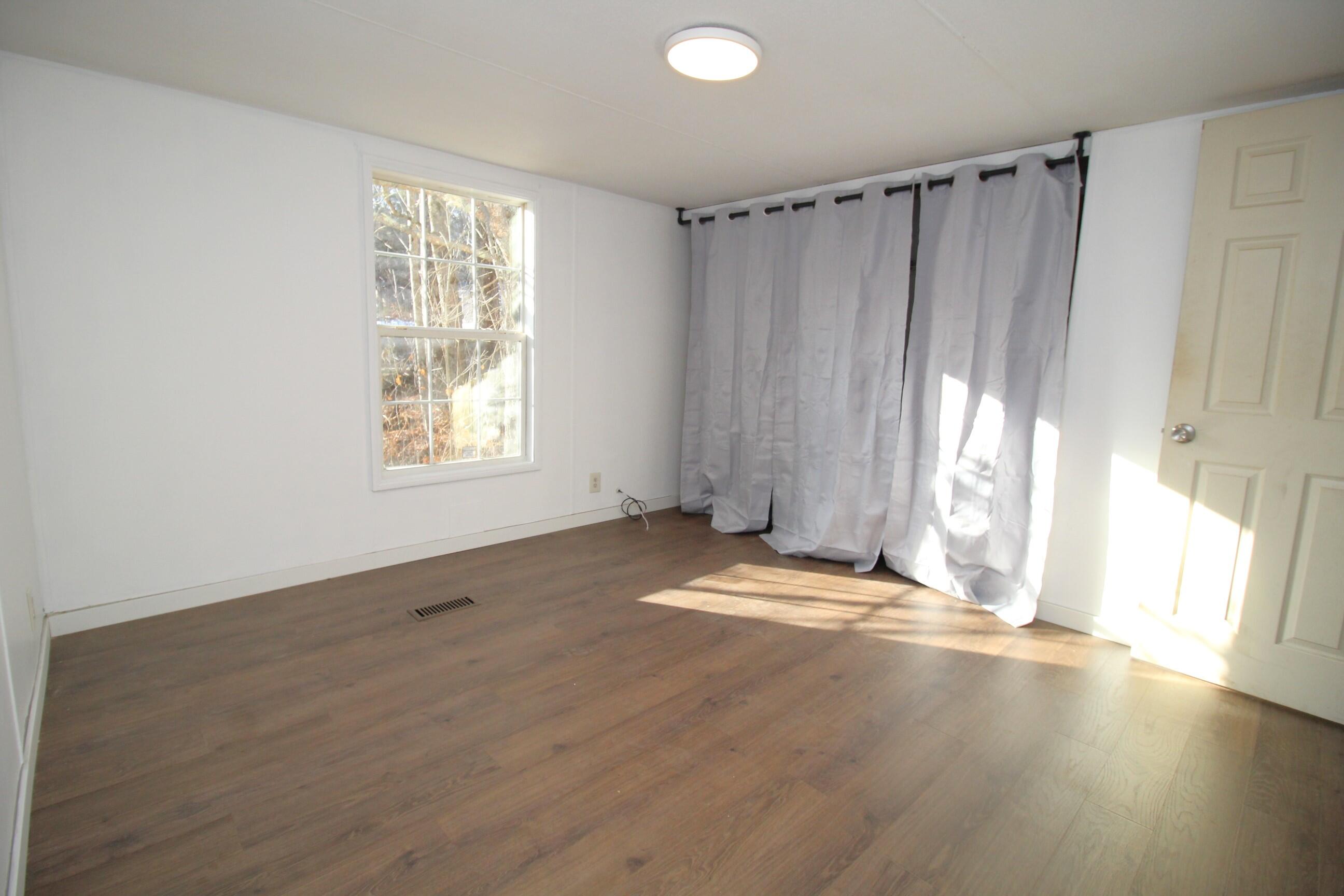 82 Fire Rd DC-1 Mount Vernon, ME 04352 - Photo 15 of 33 15. Primary Bedroom