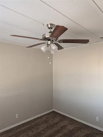 a view of a small space with a fan