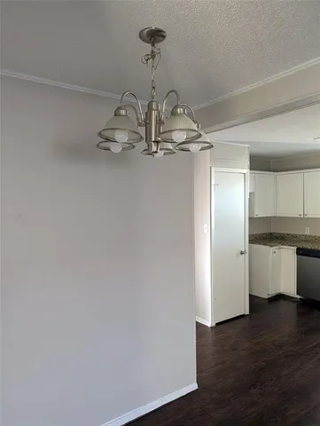 a kitchen with kitchen island stainless steel appliances a sink and refrigerator