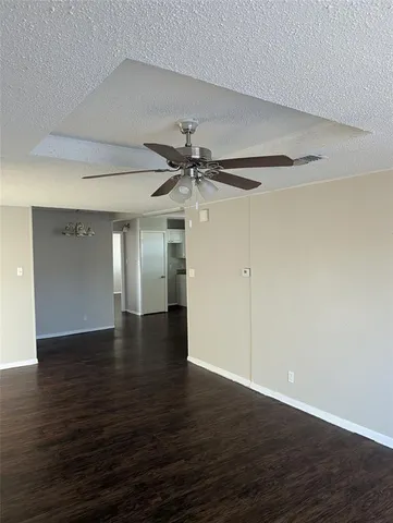 a view of a livingroom with wooden floor