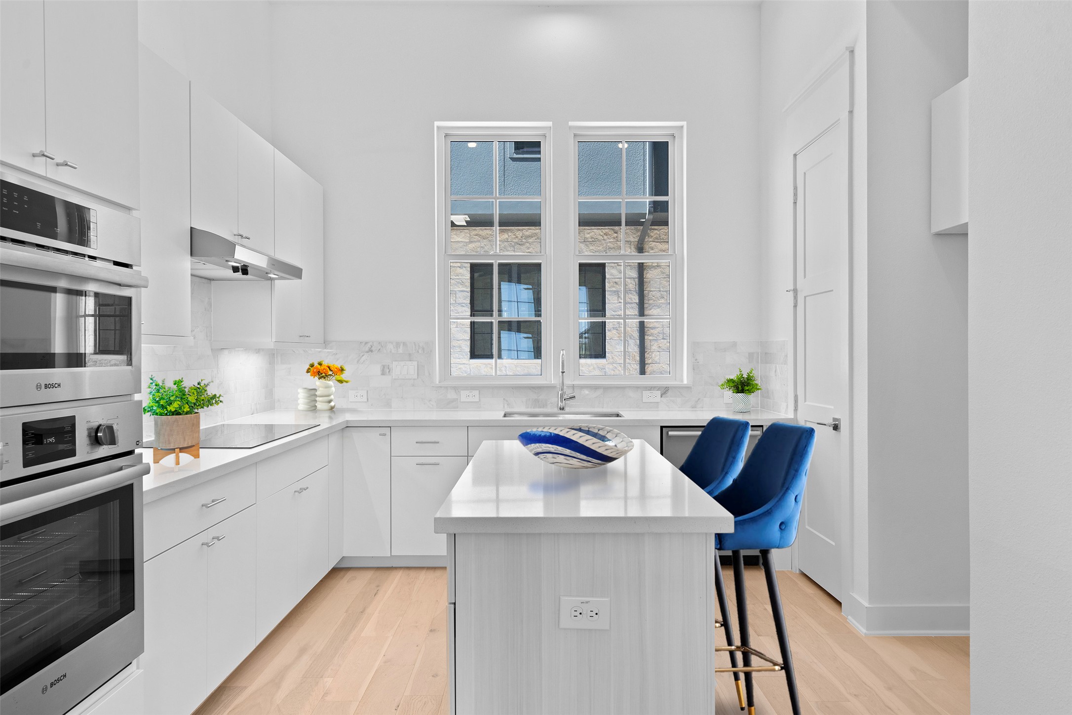 277 Pullman Court Round Rock, TX 78664 - Photo 5 of 28 a kitchen with a sink and cabinets