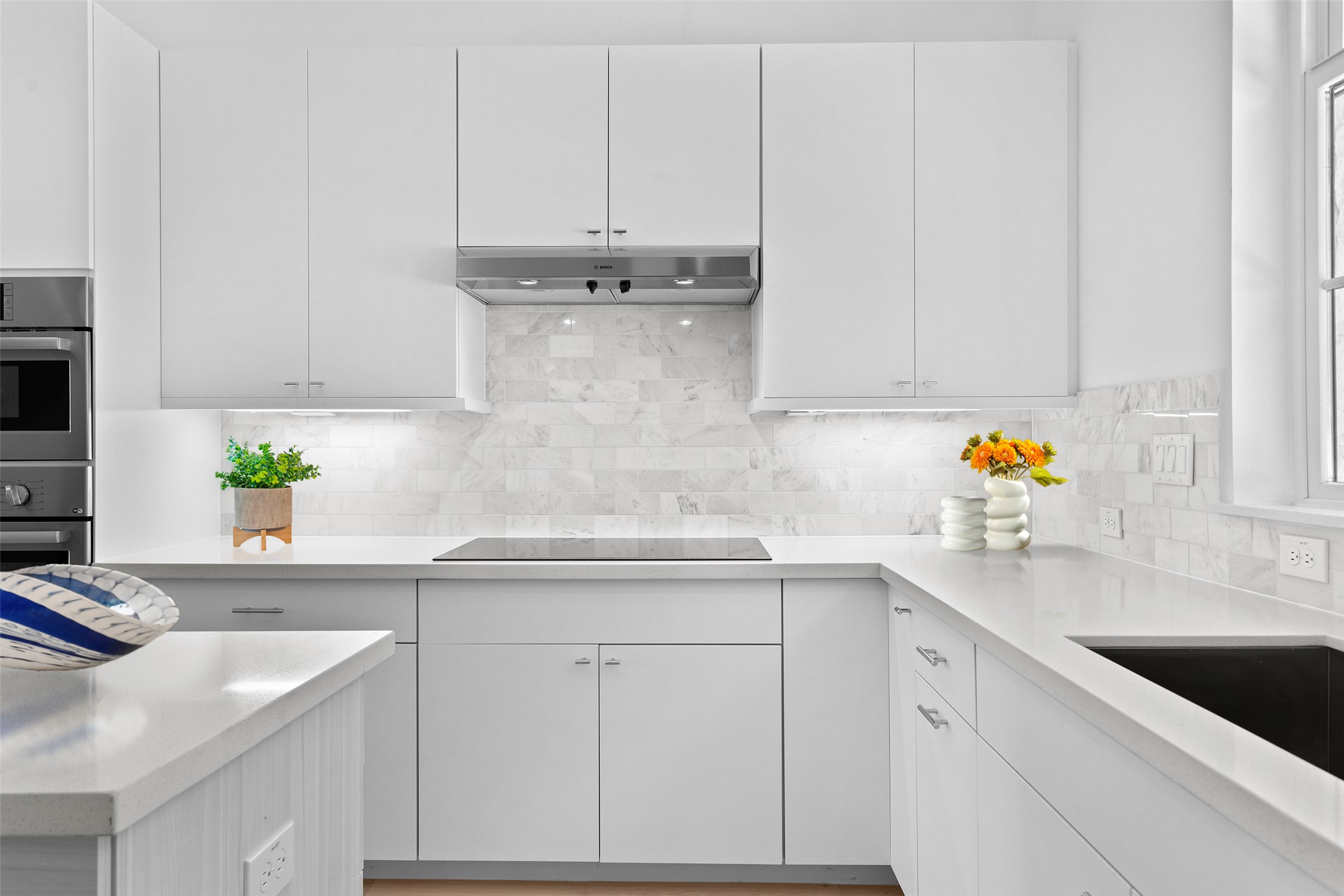 277 Pullman Court Round Rock, TX 78664 - Photo 9 of 28 a kitchen with stainless steel appliances granite countertop white cabinets sink and stove