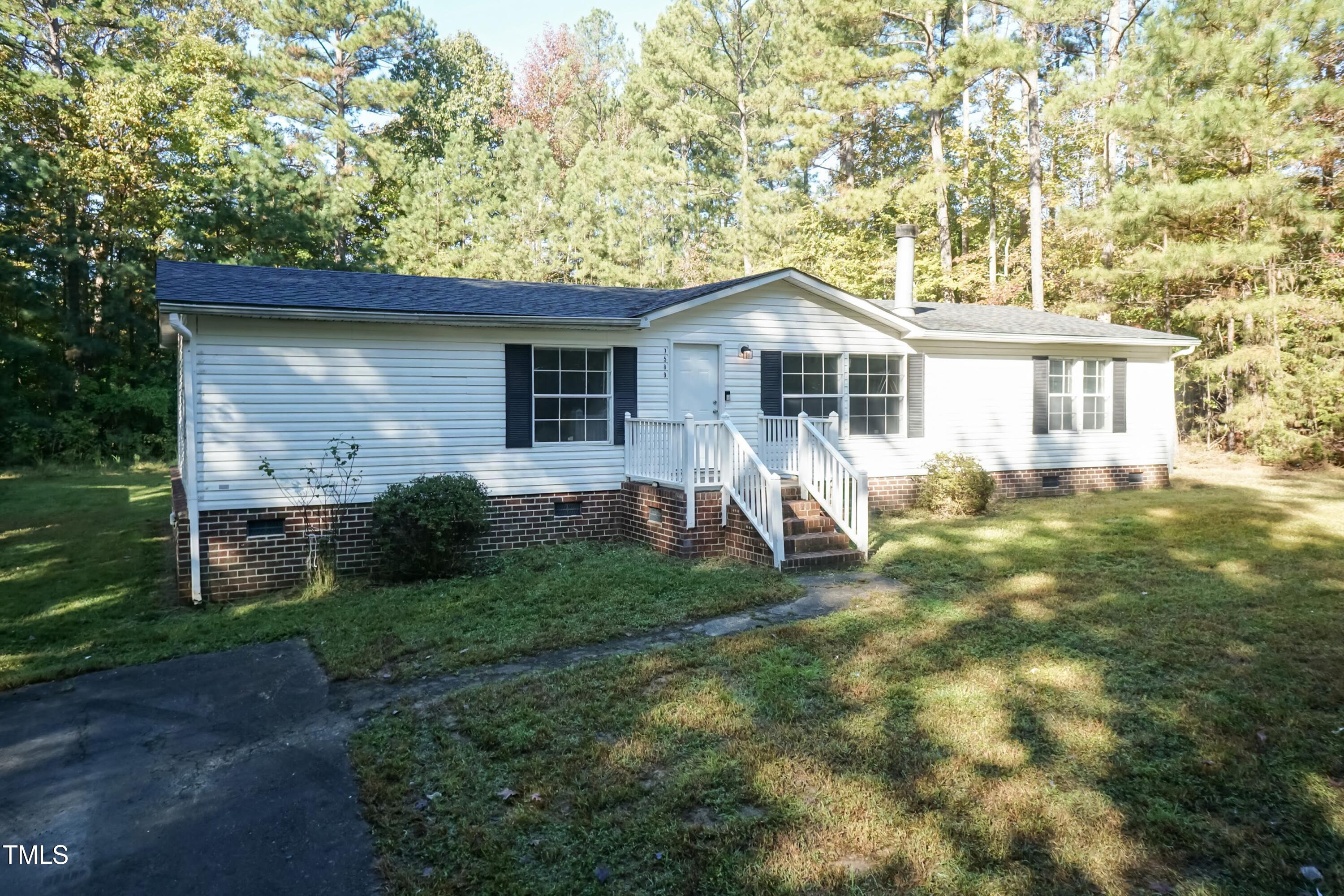 7589 Sam Hall Road Oxford, NC 27565 - Photo 1 of 40 Front 01