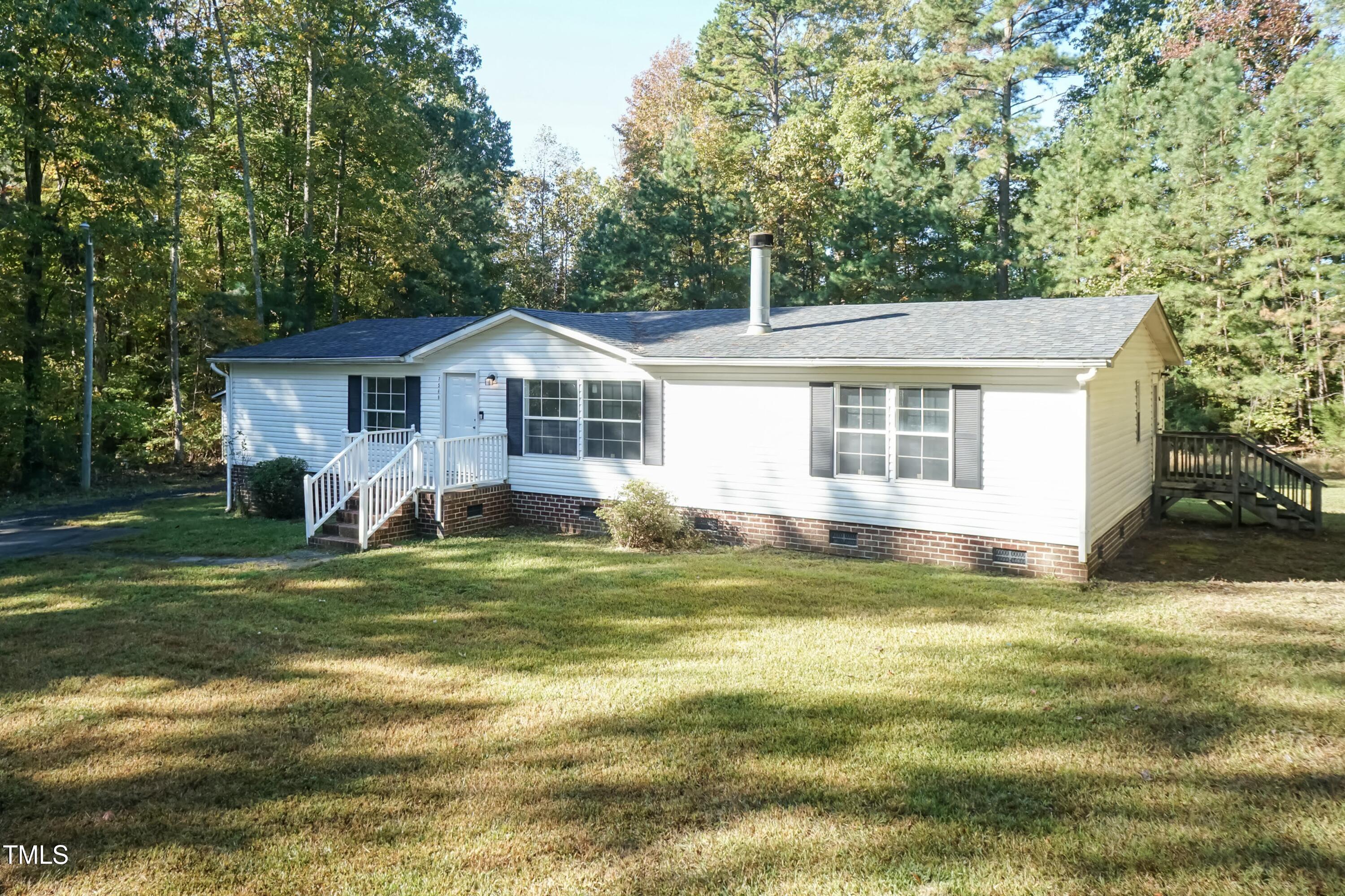 7589 Sam Hall Road Oxford, NC 27565 - Photo 2 of 40 Front 03